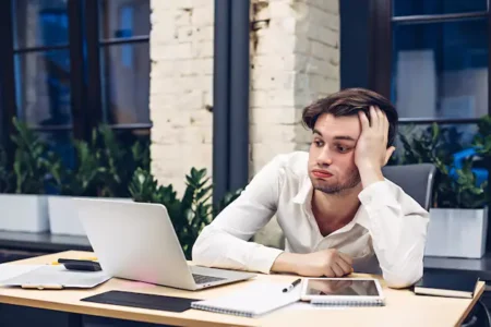 tired businessman working laptop computer table office 136930 704