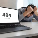 A person sitting in front of a computer screen showing “404 Page Not Found” error with a confused look.